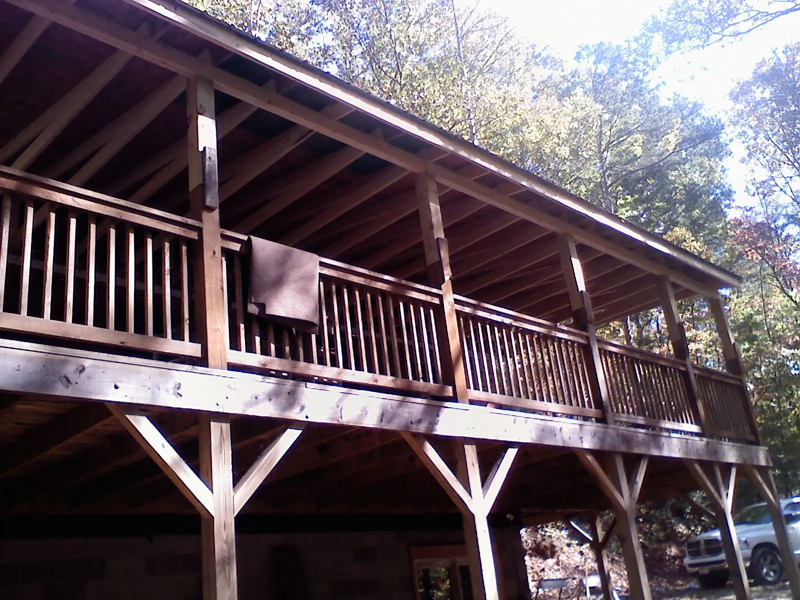 Timber framing under a new elevated porch and deck — Roof Leak Repair in Hart by Roofing Brothers